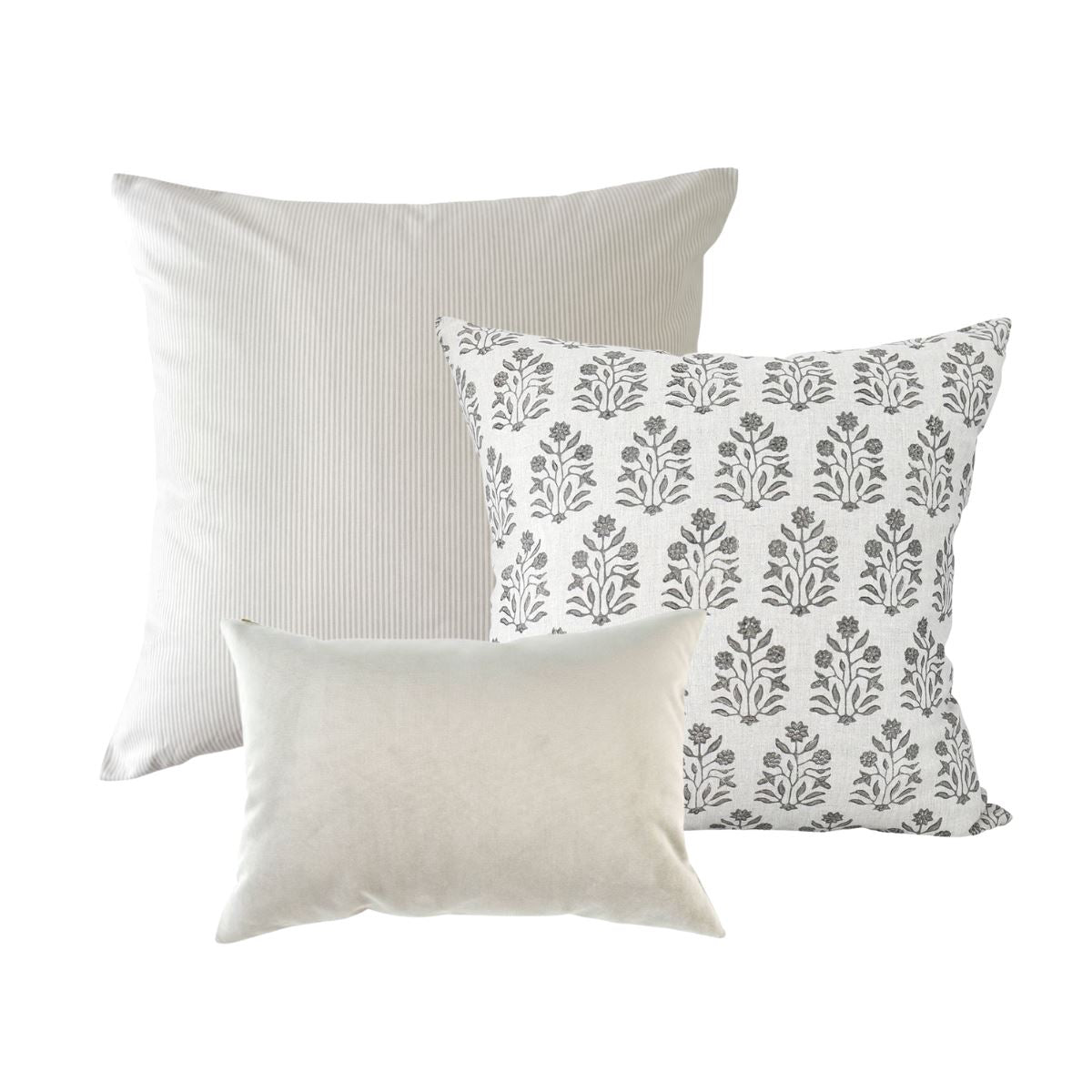 Royal Velvet Lumbar Pillow - Dove Grey styled with grey pillows. Styled view.