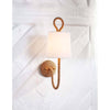 Bimini Single Sconce styled on a textured white wall. Styled view.