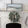 Sandbanks Landscape styled on a white mantel with wreath. Styled view.