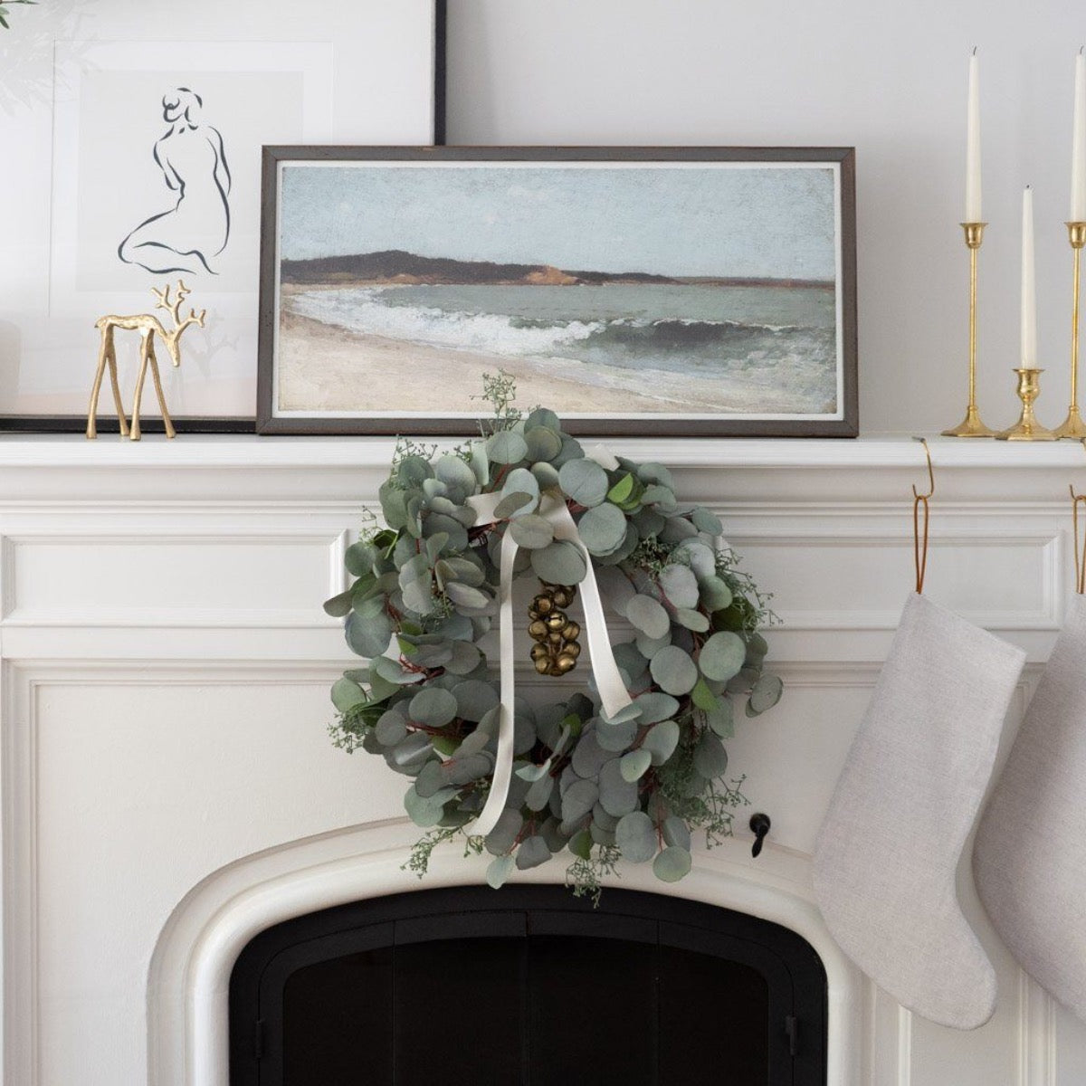 Sandbanks Landscape styled on a white mantel with wreath. Styled view.