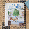 Striped Jute Rug - Navy styled with coffee table books. Styled view.
