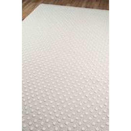 Swiss Dot Rug - Grey over wood floor. Styled view.