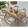 Beehive Outdoor Pendant - Large styled above a wooden dining table with fruits. Styled view.