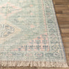 Victoria Rug styled over light wood floor. Styled view.