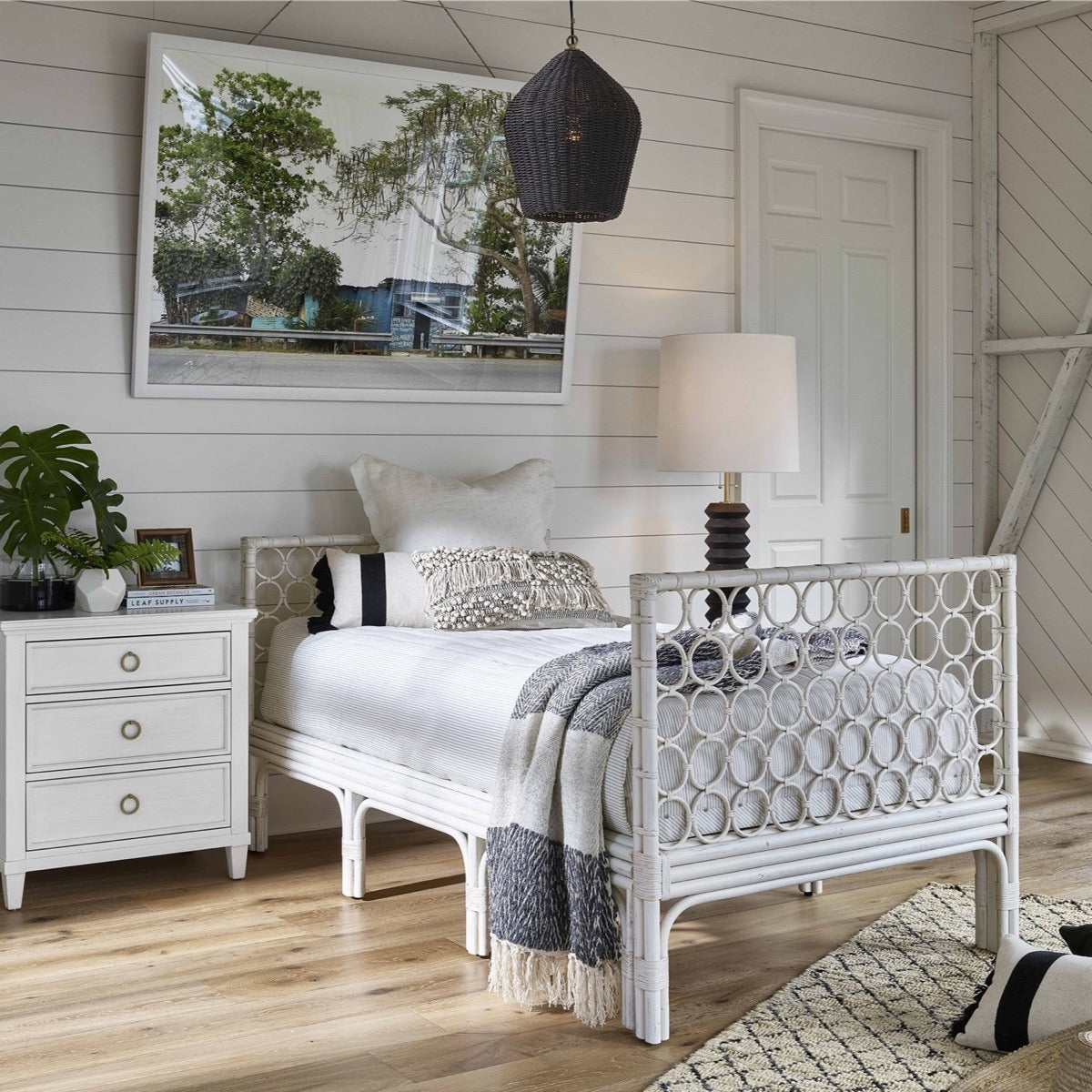 Westcoast Day Bed styled with coastal furniture in a white panel bedroom. Styled view.