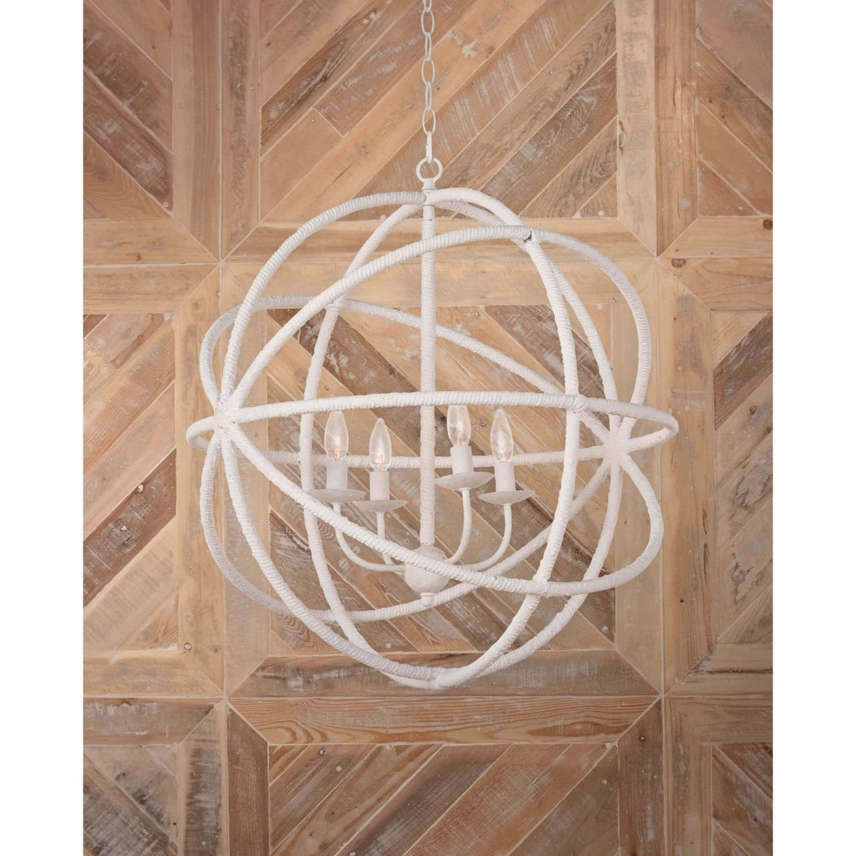 Whitman Pendant styled against a wood wall. Styled view.