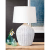 Georgian Table Lamp styled on a wood table with vases. Styled view.