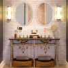Zara Mirror hanging above sinks in an industrial bathroom. Styled view.