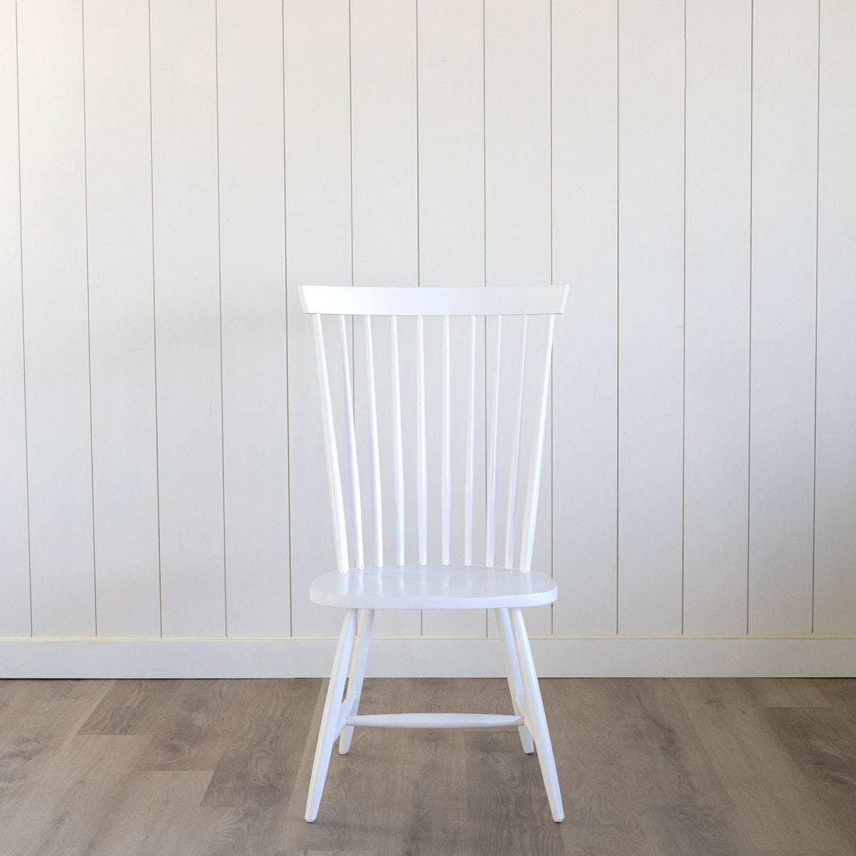Whitaker Dining Chair in Opaque White. Front view.