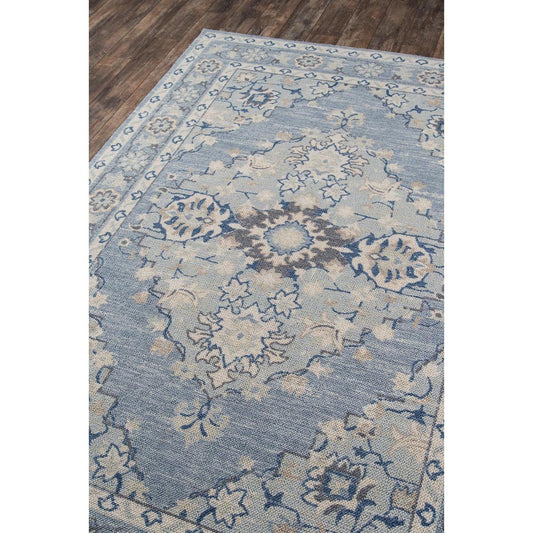 Amherst Rug styled on wood floor. Styled view. 