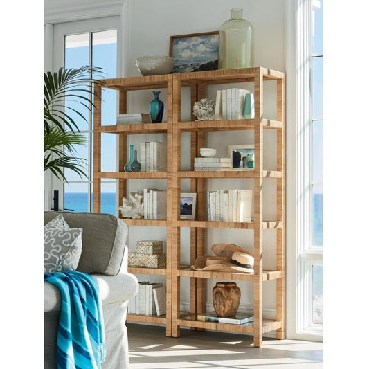 Ashley Etagere styled with books, vases and decor in a white living room. Styled view.