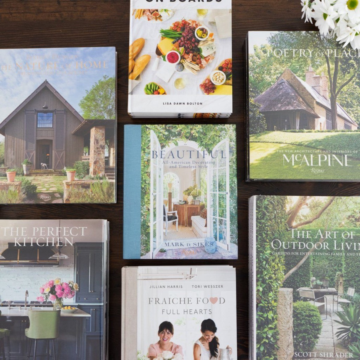 Beautiful - All American Decorating and Timeless Style Books styled with coffee table books. Styled view.