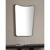 Beth Mirror styled on a neutral wall over a black console. Styled view.