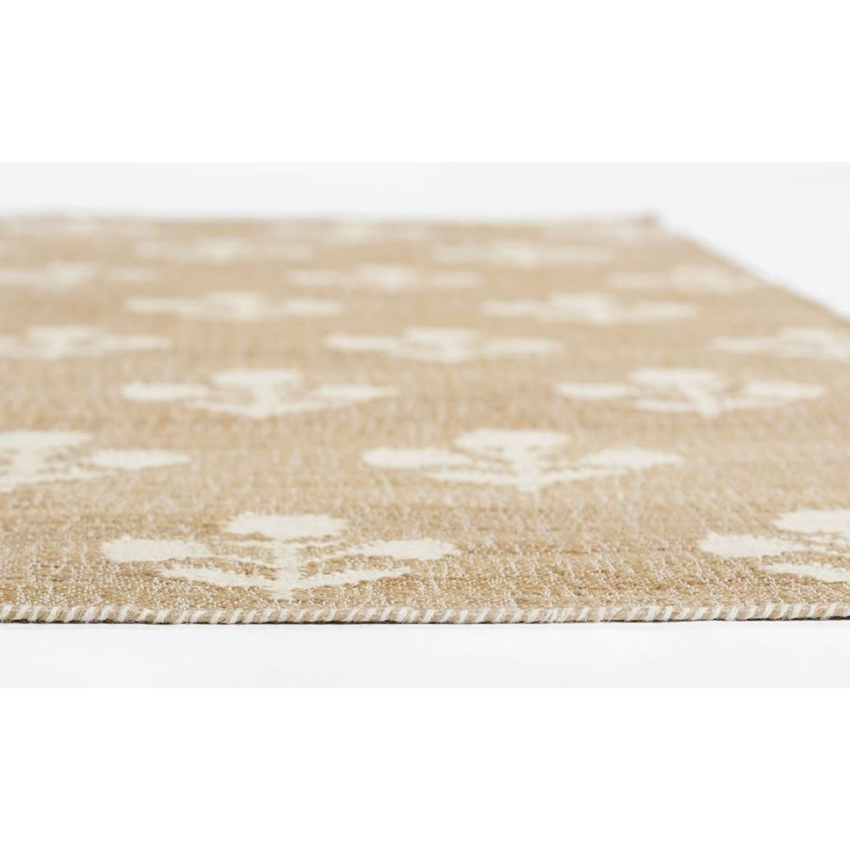 Bloom Jute Rug edge detail. Close-up detail view. 