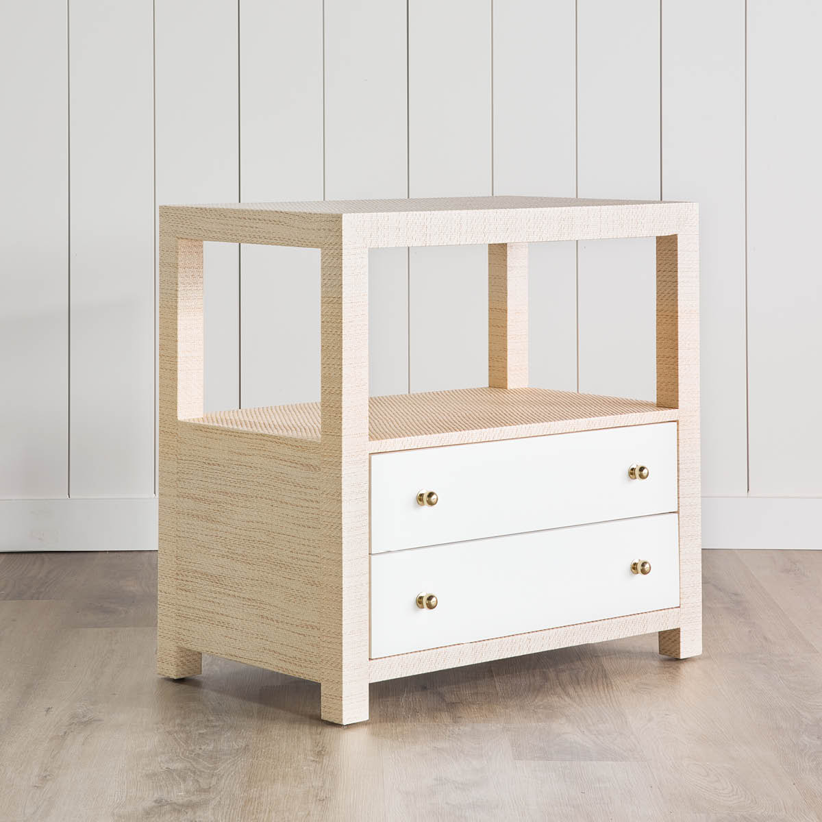 Casey Grasscloth Side Table styled in a white room. Right angle view.