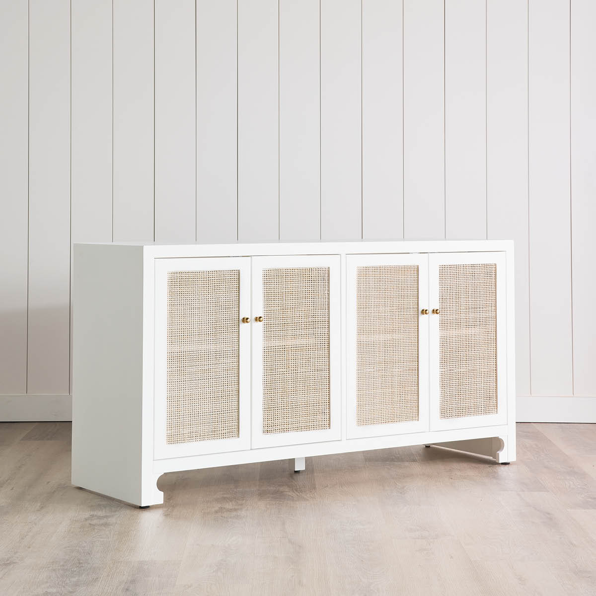 Colette Cabinet styled in a white room. Right angle view.