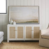 Colette Cabinet styled with beach artwork. Styled view.