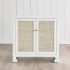 Colette Occasional Cabinet on wood floors in a white room. Styled view.