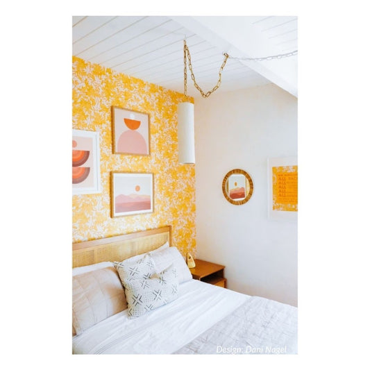 Edie Pendant styled in a n orange bedroom. Styled view. 