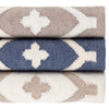 Elizabeth Navy Indoor/Outdoor Rug styled with neutral rugs. Styled view. 