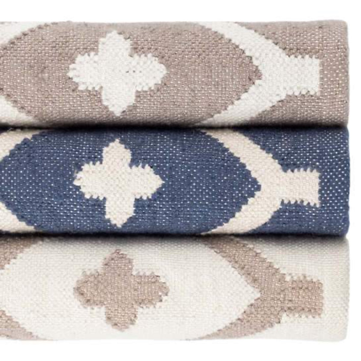 Elizabeth Navy Indoor/Outdoor Rug styled with neutral rugs. Styled view. 