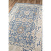 Ellesworth Rug styled on wood floor. Styled view. 
