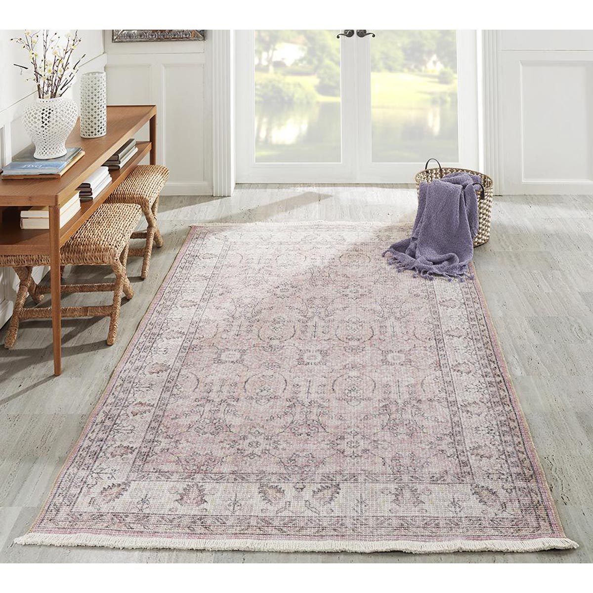 Finlay Rug - Pink styled in a hallway with console. Styled view. 