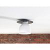 Freya Flush Mount styled against a brick wall. Styled view.