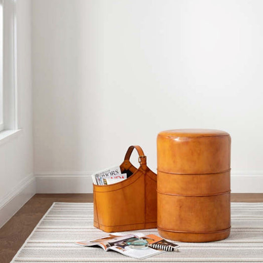 Gradation Ticking Indoor/Outdoor Rug styled with orange decor. Styled view. 