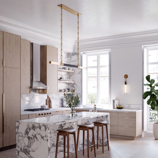 Gwynne Pendant styled over a marble kitchen island. Styled view. 