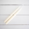 Hand-Dipped Danish Tapers - Cream styled on a white back. Styled view. 