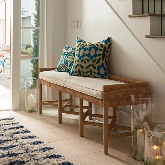Heidi Bench styled with pillows in an entryway. Styled view.