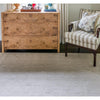 Huron Indoor/Outdoor Rug - Beige styled in a neutral room. Styled view. 