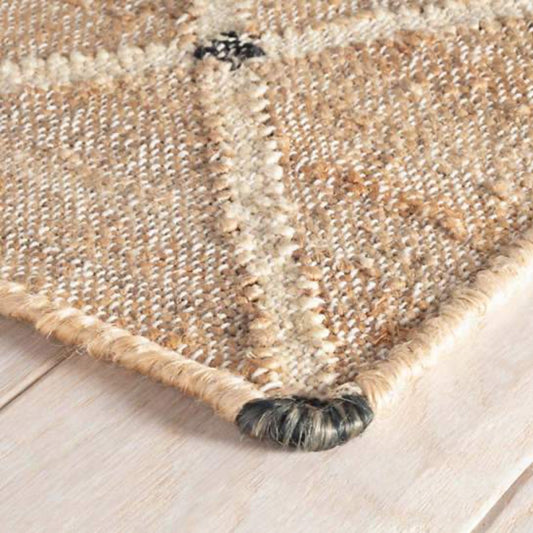 Kali Woven Jute Rug corner detail. Close-up detail view. 