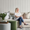 Kate Ottoman styled with a green ottoman, neutral sofa and spring decor. Styled view. 