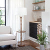 Perennial Floor Lamp Floor Lamp styled in a neutral living room. Styled view.