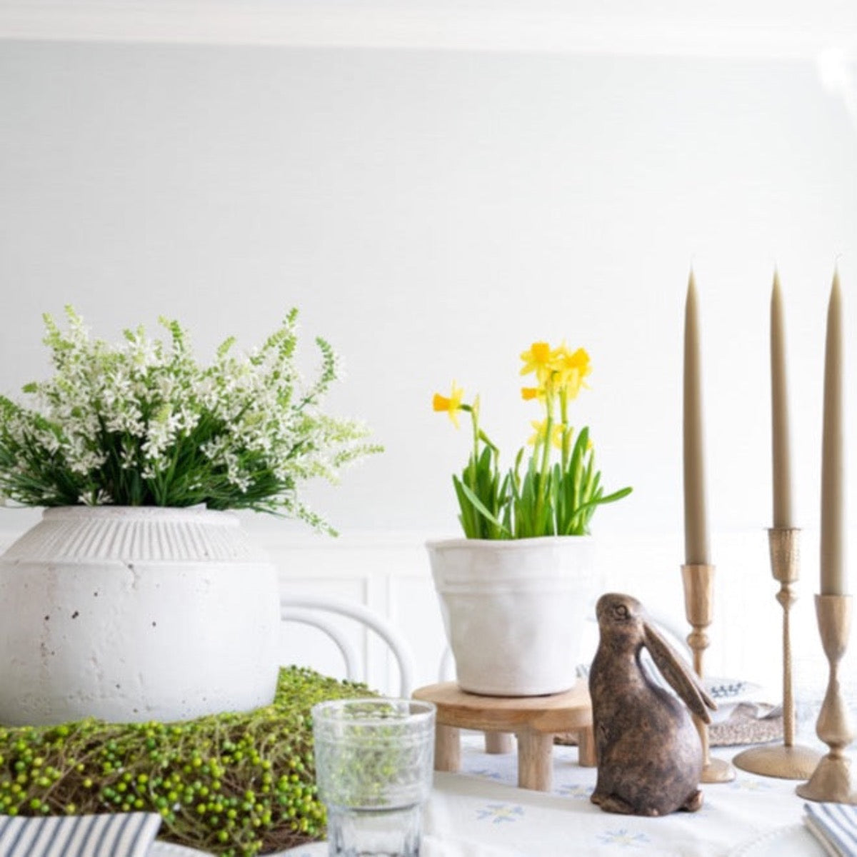 Leta Teak Stand styled with florals and pots. Styled view.