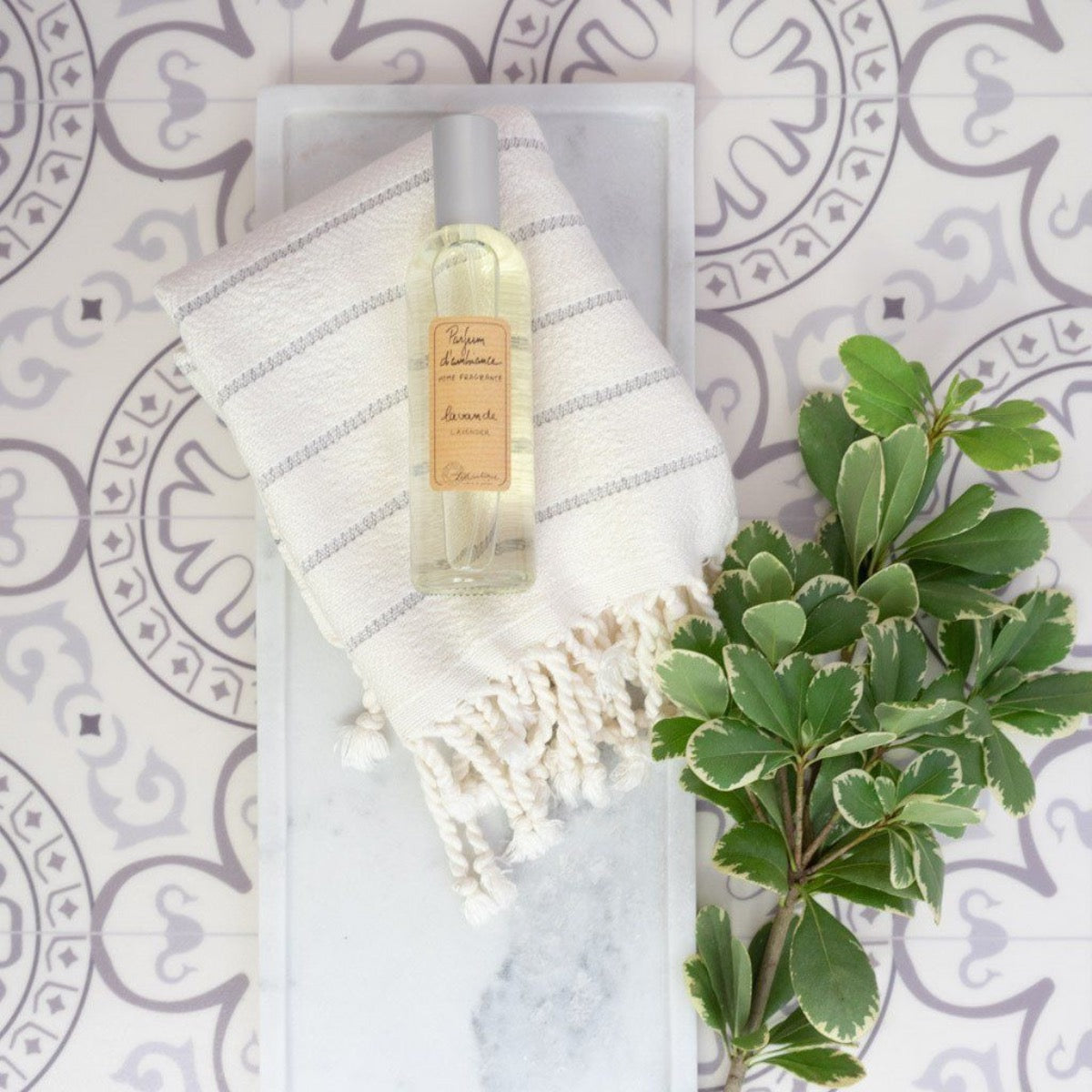 Long Marble Tray styled with soap, clothes and greenery. Styled view. 