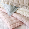 Lush linen puff bedding. Styled view.