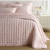 Lush Linen Slipper Pink Puff styled with pink sheets. Styled view. 