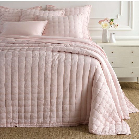 Lush Linen Slipper Pink Puff styled with pink sheets. Styled view. 