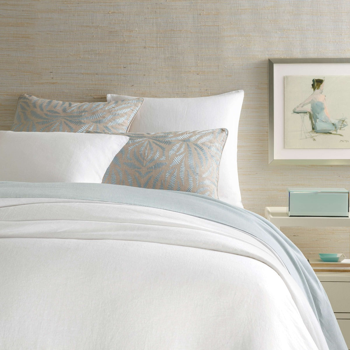 Lush Linen White Duvet Cover styled with blue sheets. Styled view. 