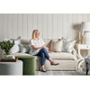 Margot Sofa styled with spring decor and ottomans. Styled view. 