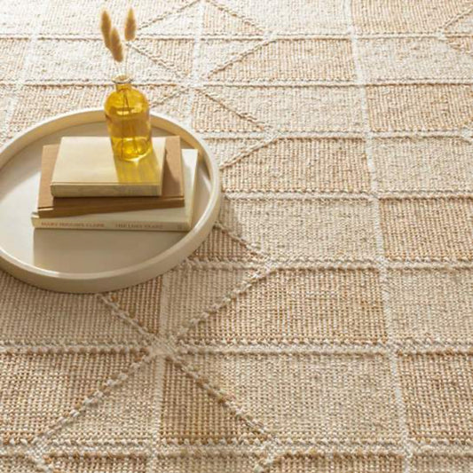 Ojai Wheat Loom Knotted Cotton Rug styled under a decorative tray. Styled view. 