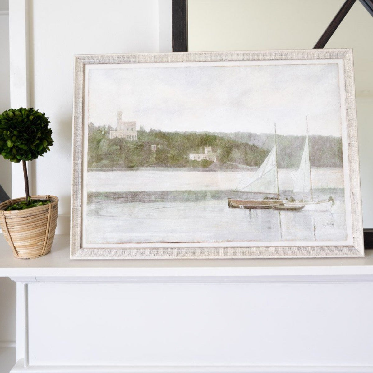 On The Lake styled on a white shelf with greenery. Styled view.