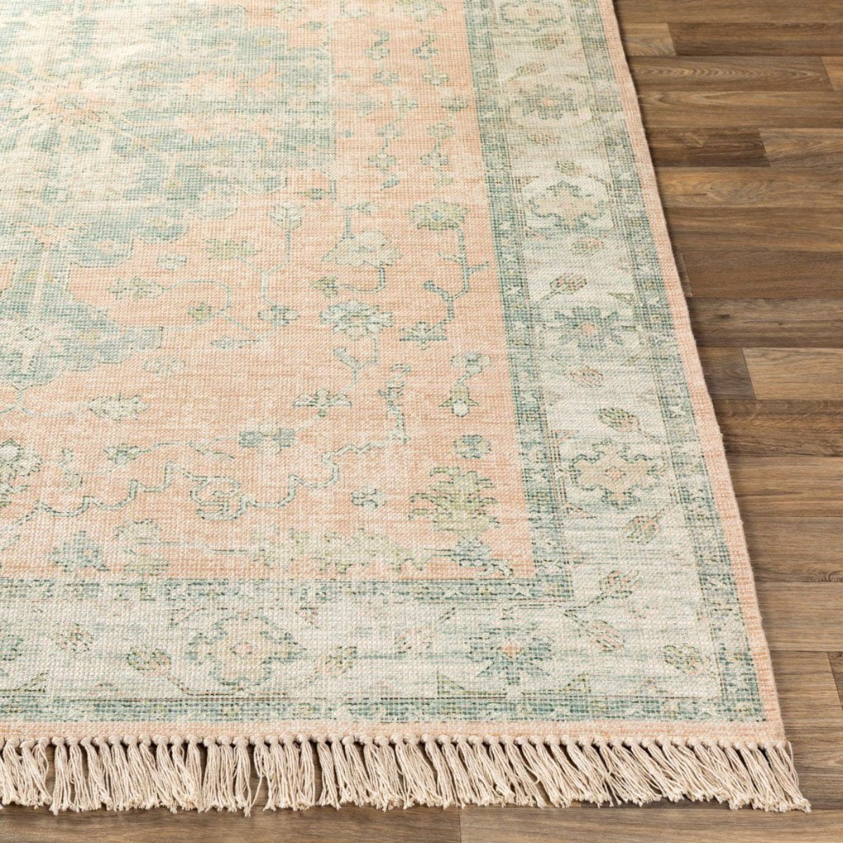 Palmer Rug on light wood floor. Styled view. 