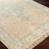 Palmer Rug on a dark wood floor. Styled view. 