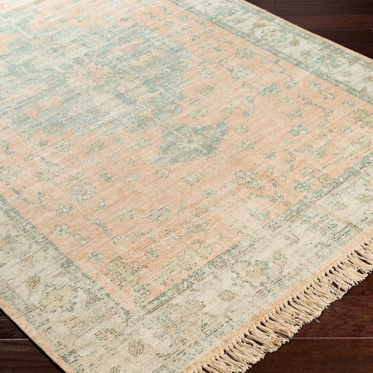 Palmer Rug on a dark wood floor. Styled view. 
