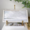 Petite Scapes - Coastal Scene with Cliffs styled in brass easel. Styled view.