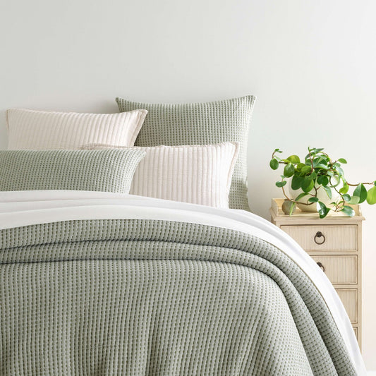 Pick Stitch Evergreen Matelasse Coverlet styled with white bedding. Styled view. 